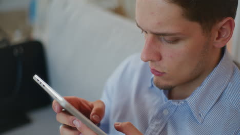 man shopping online on tablet