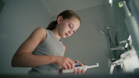 girl brushing teeth