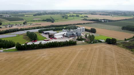 aerial view of farm facility surrounded by ploughed fields between wingham to aylesham