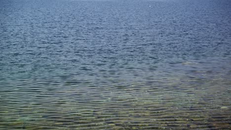 Small-waves-on-the-pebble-beach