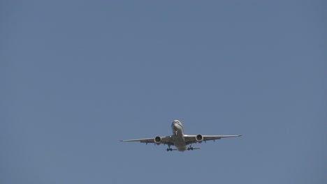 airplane-landing-at-local-airport-over-city