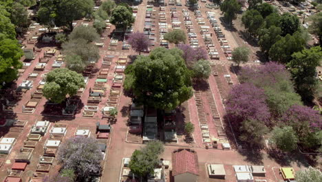 Scenic-aerial-flight-directly-above-densely-packed-cemetery-graveyard