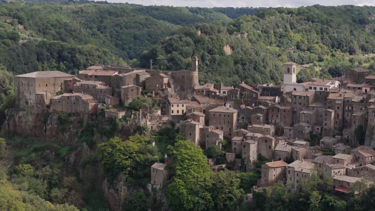 Sorano Tuscany Italy, telephoto drone orbit, sunny weather