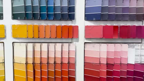 various paint samples displayed in a store