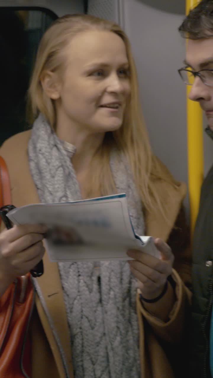 People reading on a train