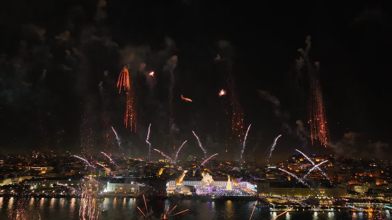 Aerial view of New Years eve fireworks and the Lisbon city skyline in Portugal
