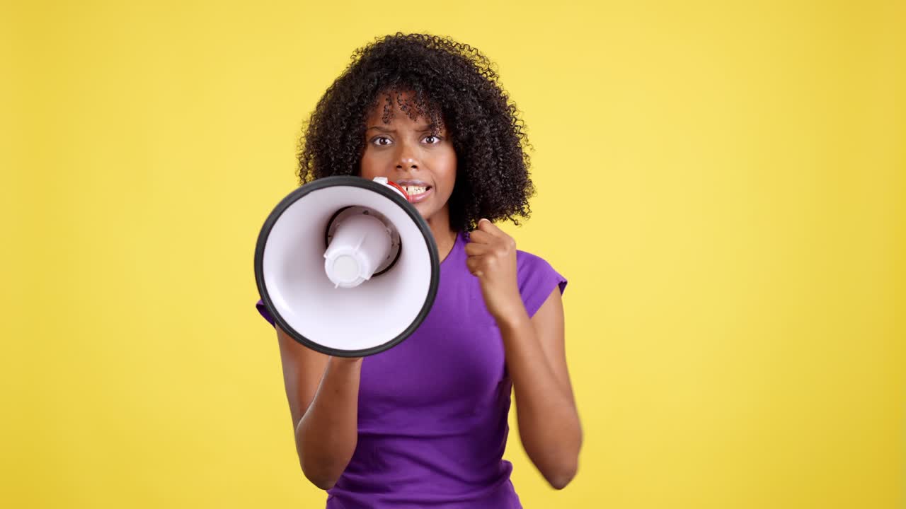 Woman Shouting Angrily into a Megaphone