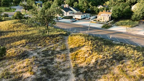 Drone-moving-into-position-over-sandy-beach-homes