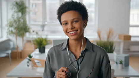 smiling young professional woman in a modern office