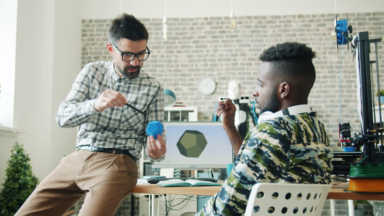 Two Colleagues Discuss 3D Printing Design