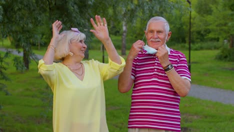 Quarantine-Coronavirus-is-over-ended-concept,-senior-old-family-grandparents-take-off-medical-masks