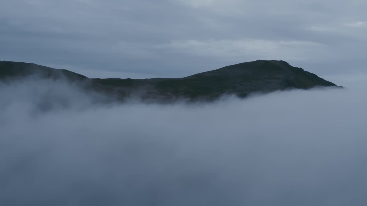 Remote, misty landscape from a high perspective. North Norway