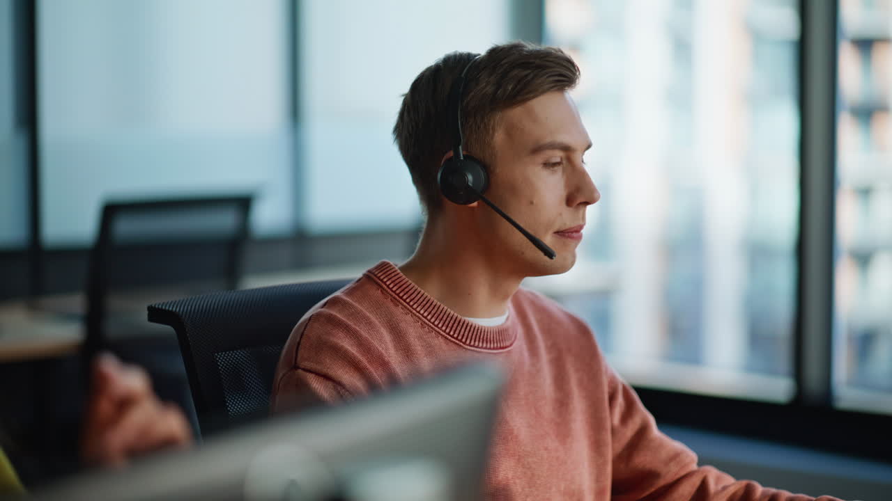 Customer service consultants helping client talking in coworking space closeup