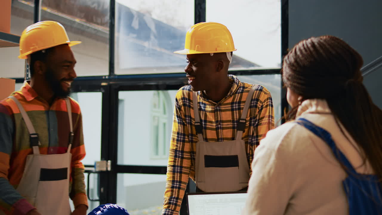 Construction workers discussing project plans