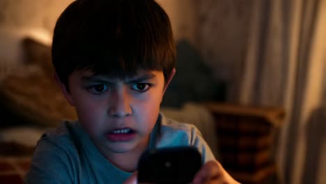 angry child using smartphone