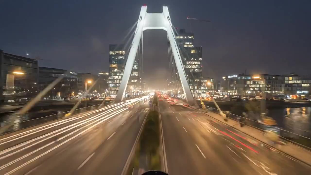 Captivating Urban Transition: A Stunning Journey from a Foggy Morning to a Lively Night in a Modern Metropolis with Vibrant Life and Energy