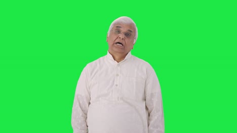 Sleepy-and-tired-Indian-old-man-yawning-Green-screen