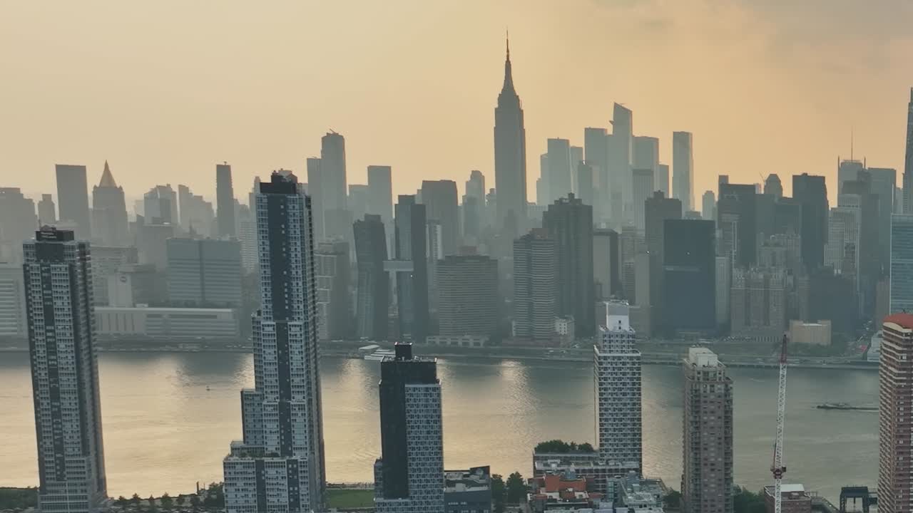 Stunning aerial view of New York City's skyline at sunset