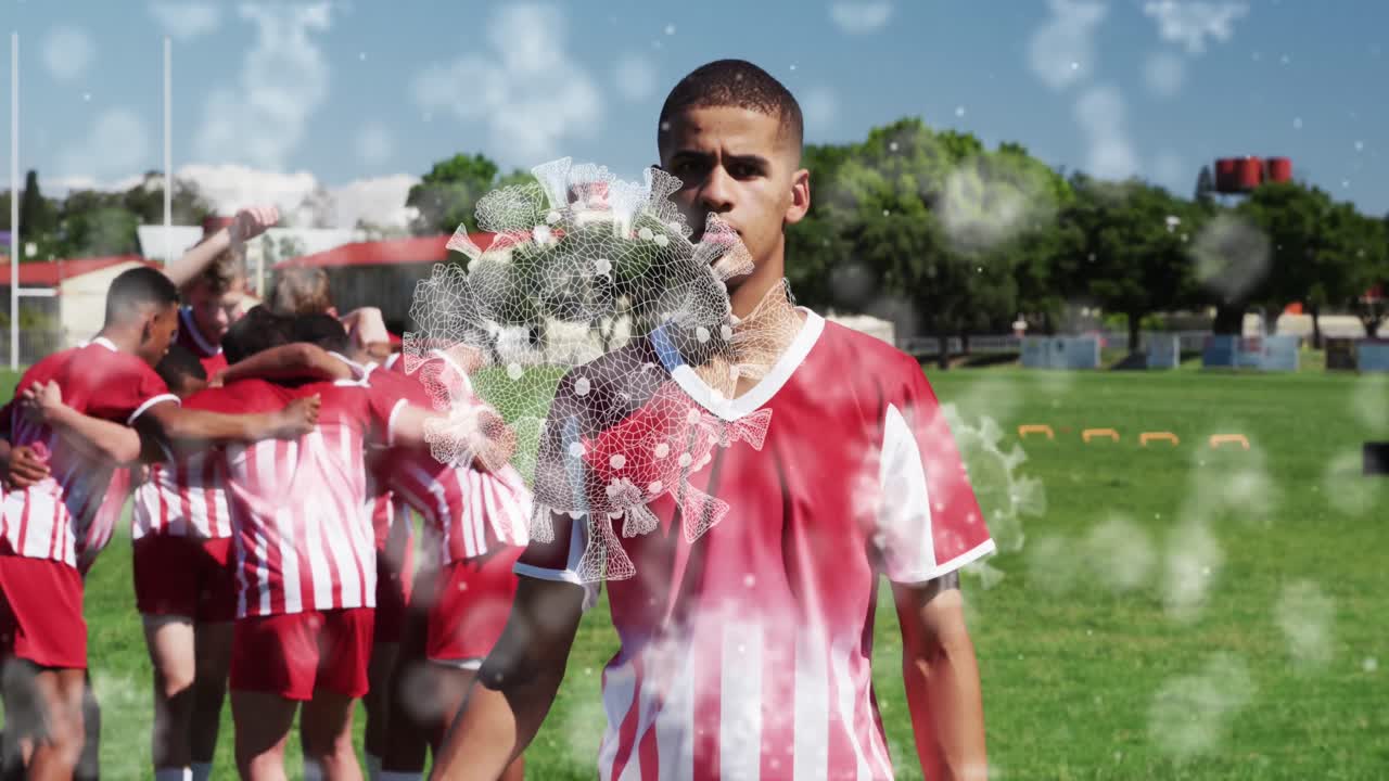 animación de células de virus sobre diversos jugadores de rugby masculinos que se unen en equipo