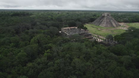 mayan ruins aeriel flying over old ruins chichen itza drone jungle mexico guatemala tikal