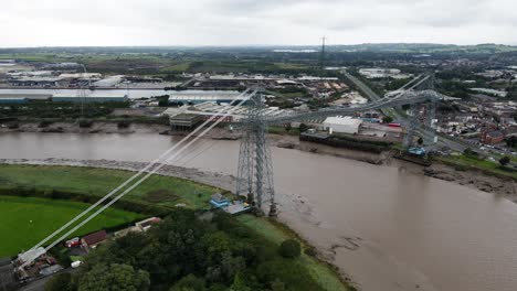 Newport-transporter-bridge-historic-landmark-orbit-left-across-river-Usk-waterfront-South-Wales