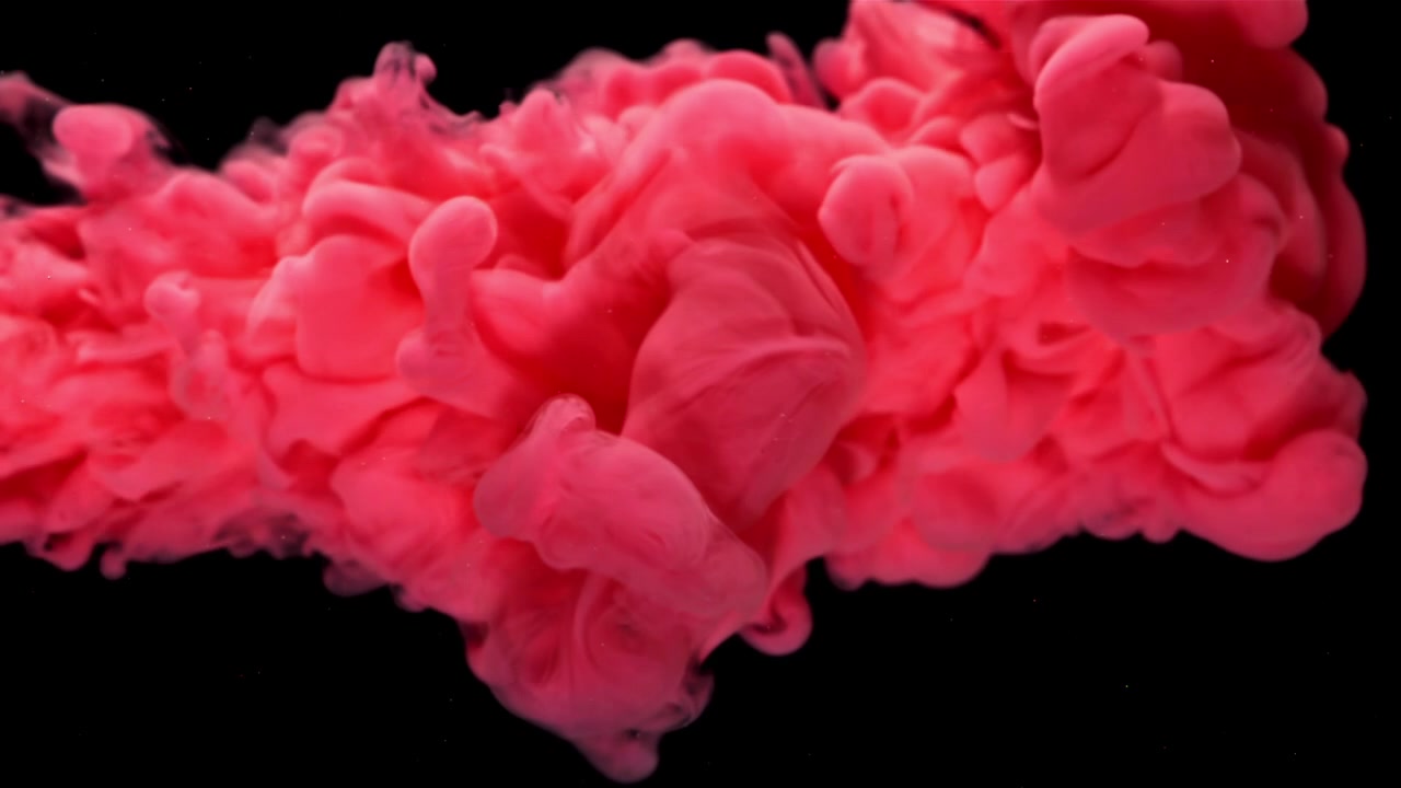 Vibrant Red Ink Cloud Expanding in Slow Motion Underwater