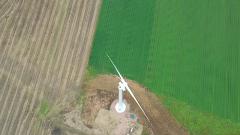 fast ascending shot over wind turbine