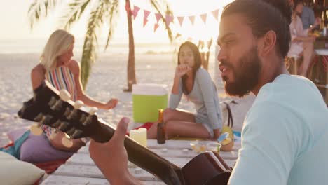 friends enjoying a party on the beach