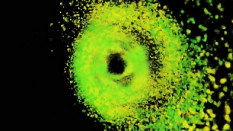 dynamic spiral pattern of vibrant green and yellow particles creating a mesmerizing visual display against a dark background