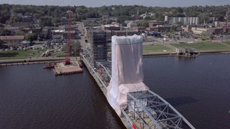 Stillwater,-Minnesota-lift-bridge-renovations,-aerial-rise-up-shot