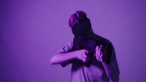 man in vr headset with gun