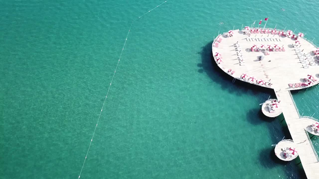 Luxury Beach Pier with Sunbeds and Umbrellas