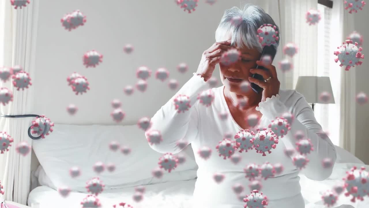 Animazione di cellule Covid-19 che fluttuano sopra una donna malata