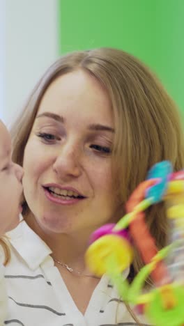 mother with girl being examined by female pediatrician