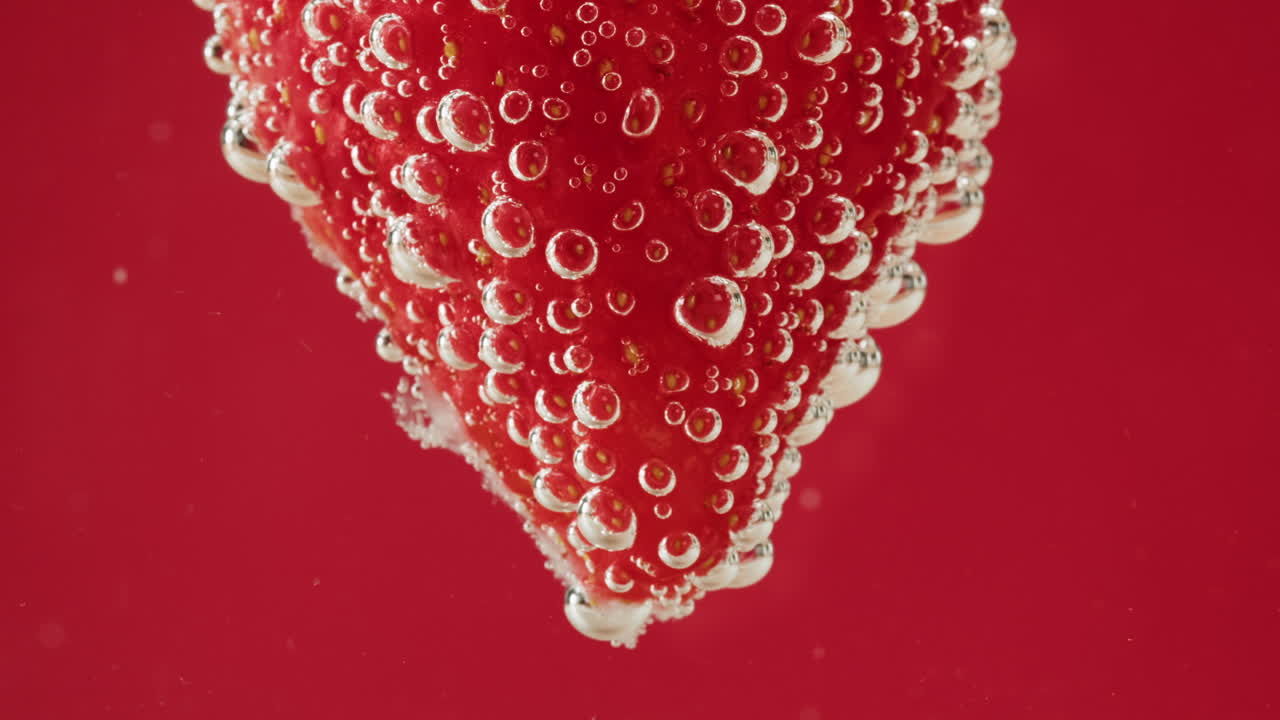 Strawberry Underwater with Bubbles