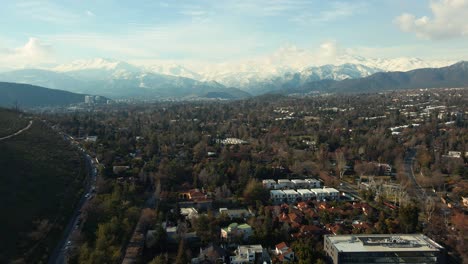 Hillside-Of-Cerro-Calan-Observatory-Park-And-Extensive-Residential-Community-Covered-In-Lush-Vegetation-In-Las-Condes,-Santiago,-Chile