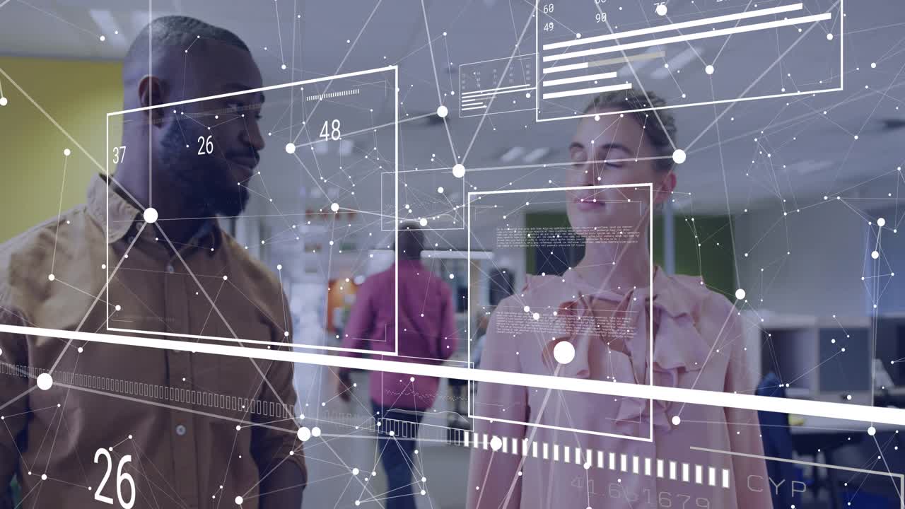 Business colleagues walking office aisle and activating 3D data panels while analyzing metrics