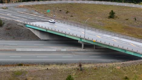 Aerial-Perspective:-Meadow-Creek-Rd-Bridge-Over-Coquihalla-Highway-Near-Kamloops-with-Cars-and-Trucks