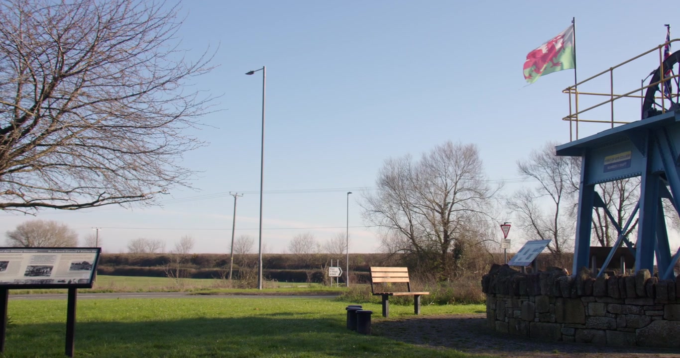 Wide planning shot right to left of the Mining Memorial at Ffynnongroyw, Holywell