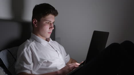 teenage victim of cyber bullying using laptop shot on r3d