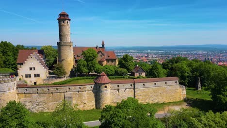 4k aerial drone video of the historic bamberg castle on the edge of bamberg, germany on a beautiful spring day
