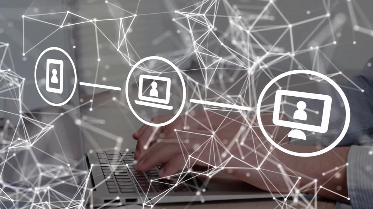 Male worker placing hands on laptop keys and typing activating tech web linking phone PC icons