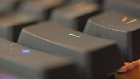 macro view of enter key being tapped multiple times