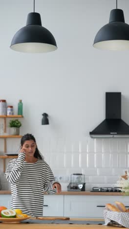 modern kitchen with woman