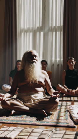 yoga meditation session with a spiritual teacher