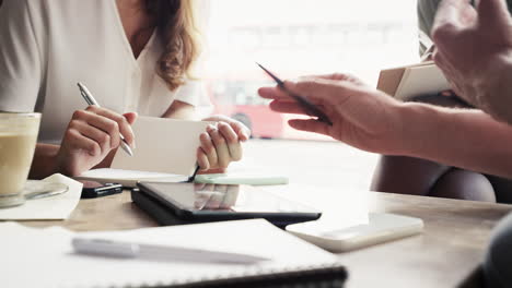 Closeup-hands-Business-people-meeting-in-cafe-using-digital-tablet-big-data