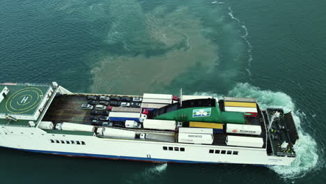 ferry in motion, loading/unloading vehicles