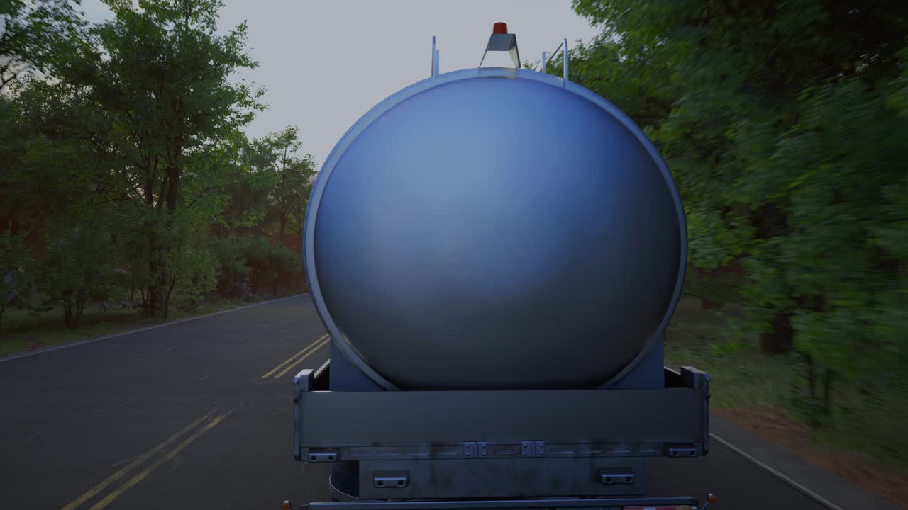 Tanker Truck on a Country Road at Sunset