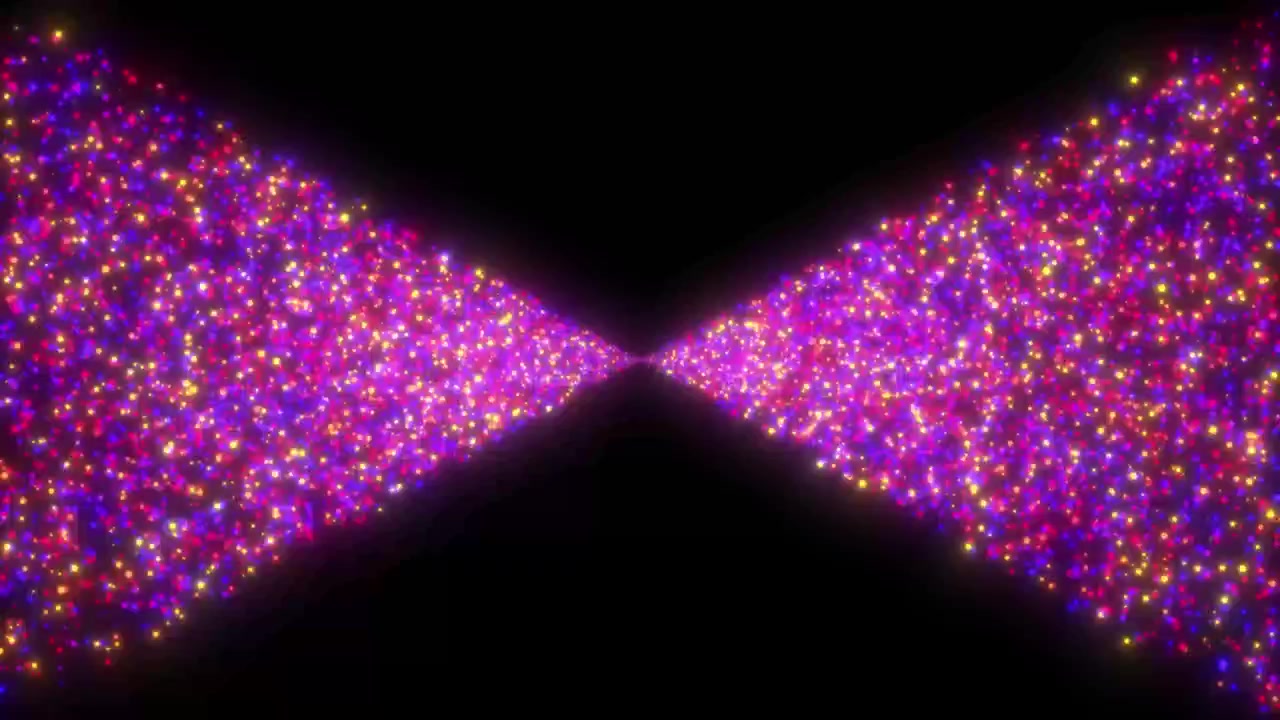 Animazione di particelle colorate che brillano dal centro, isolata su sfondo nero