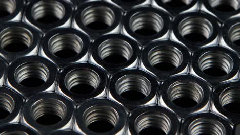 close-up of silver metal hex nuts